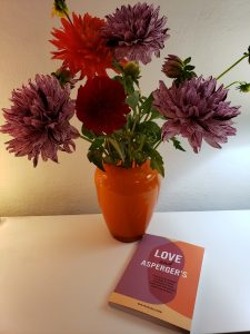 flower vase and book